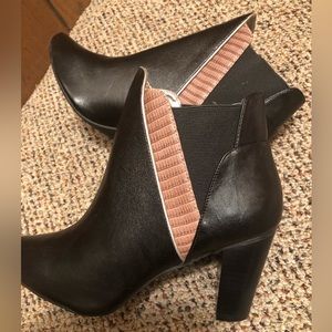 New in the package mark. Sideswipe booties black and tan. Size 6,8 and 10